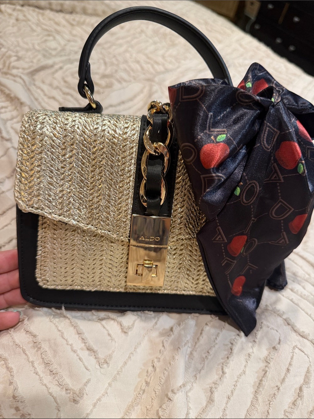 Aldo Gold Woven Satchel with Black Trim and Red-Print Scarf Accent